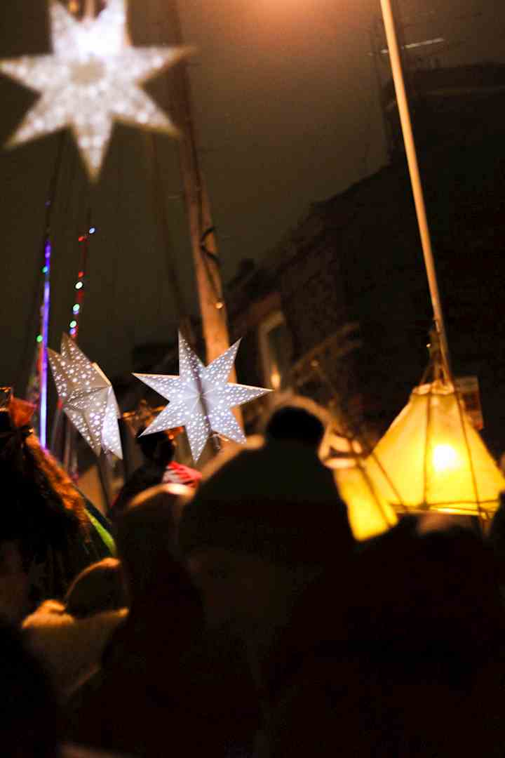 Lit lanterns hanging down